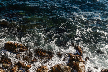 Storm on the sea, foam and waves, top view