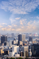 Aerial skyscraper view of office building and downtown and cityscapes of Tokyo city with blue sly and clouds background. Japan, Asia