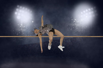 Woman in action of high jump