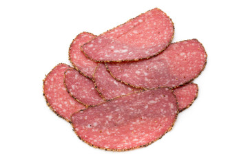 Salami slices isolated on the white background.