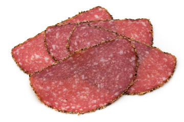 Salami slices isolated on the white background.