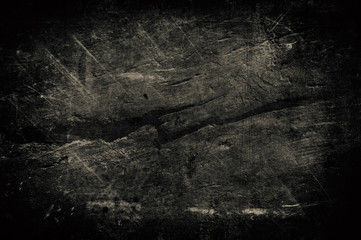 Grunge monochrome, the surface of an old fractured wooden board.
