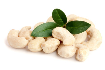 cashew nuts with leaf isolated on white background. macro