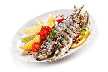 Fish dish - grilled herrings with vegetables