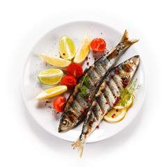 Fish dish - roasted trouts with vegetables