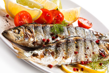 Fish dish - grilled herrings with vegetables