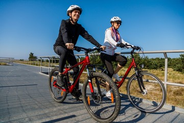 Healthy lifestyle - people riding bicycles