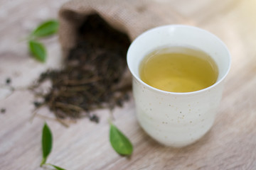 cup with green tea on the table