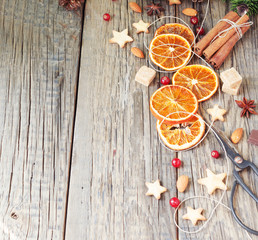 Christmas gingerbread cookies stars on a wooden table and cookie cutters, selective focus
