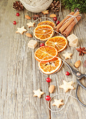 Christmas gingerbread cookies stars on a wooden table and cookie cutters, selective focus