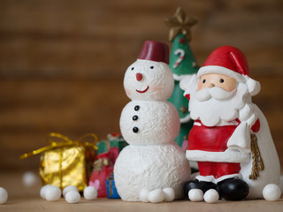 Cute Santa Claus with christmas props for celebrate christmas time