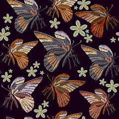 Butterflies and flowers embroidery seamless pattern. Beautiful vintage butterflies classical embroidery seamless background template for clothes, textiles, t-shirt design