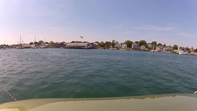 Timelapse of car ferry ride from Chappaquiddick to Edgartown across harbor during busy tourist season