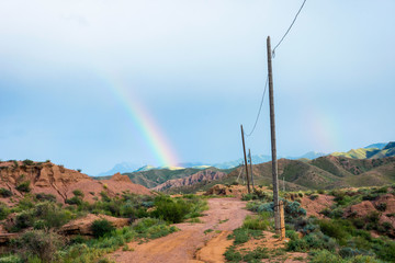 Rainbow over Skazka canyon, kyrgyzstan