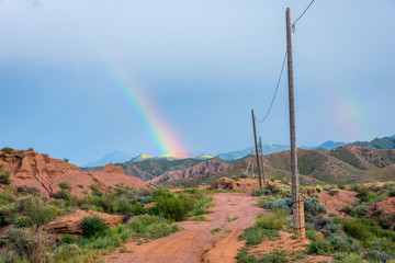 Rainbow over Skazka canyon, kyrgyzstan