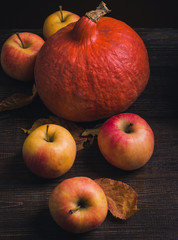 autumn still life with pumpkin and apples