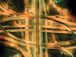 Elevated expressway. The curve of suspension bridge, Aerial view. Top view. Background scenic road.