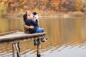 parents play with little daughter