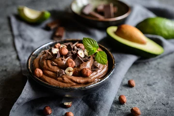 Gordijnen Raw avocado chocolate mousse with hazelnuts © noirchocolate