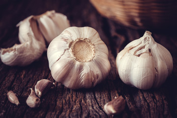 Close up  group of garlic on kitchen wooden table