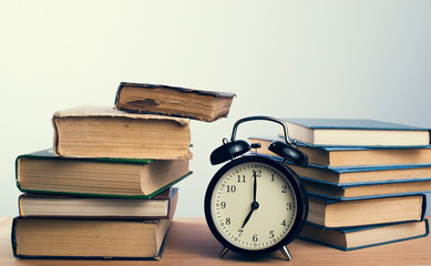 books and alarm clock