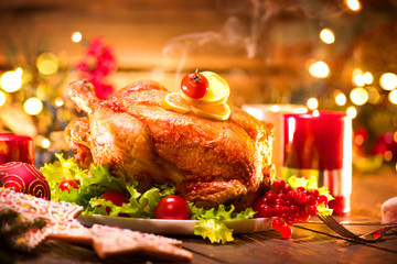 Fototapeta na wymiar Christmas holiday dinner. Served table with roasted turkey