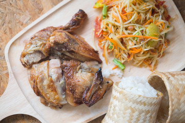 Papaya salad and grilled chicken with sticky rice