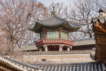 Fototapeta premium wooden pagodas in the park of seoul city in korea in winter