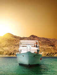 Yacht and mountain