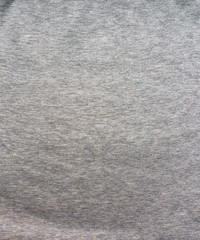 Fabric fleece, Color grey melange. Beautiful textile backdrop. Close-up. Top view 