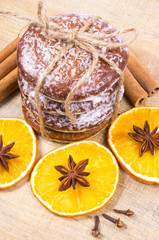 Gingerbread cookies, cinnamon and orange slices. Christmas decoration.