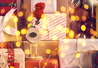 Holiday Christmas background with gift boxes and decoration