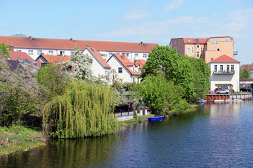 Obraz premium Cityscape of Rathenow (Germany) with Havel river and traditional houses