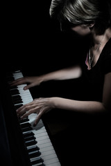 Piano player. Pianist playing piano concert