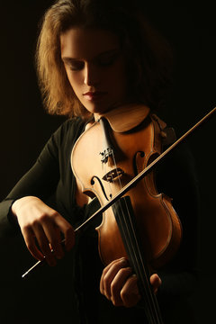 Violin player. Violinist playing violin