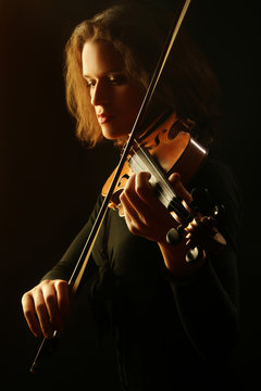 Violin player. Violinist playing violin