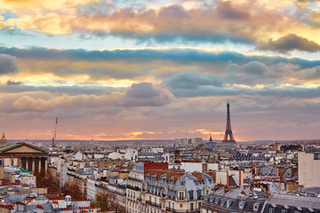 Parisian skyline with the Eiffel tower at sunset