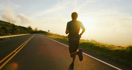 Athletic Man Running at Sunset