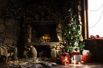 Fototapeta na wymiar Christmas decorated fireplace