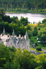 Tigh Mor with Loch Achray in the background is a luxury property in the heart of the scottish highlands.