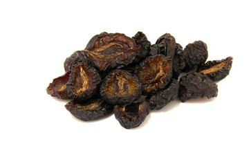 Dried plum on white background