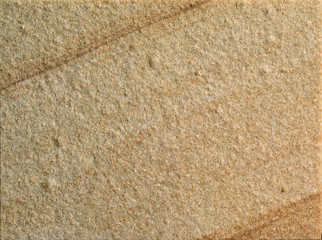 Close-up sand stone texture. Material construction.