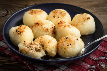 Potato dumplings with meat.