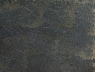Black granite stone texture. Material construction.