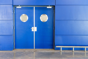 Naklejka premium blue double door interior view of a room