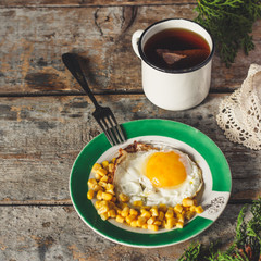 fried egg (serving) and other products on a wooden surface