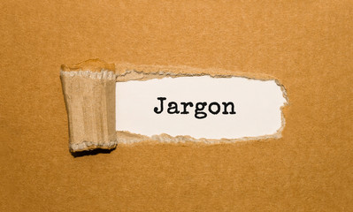 The text Jargon appearing behind torn brown paper