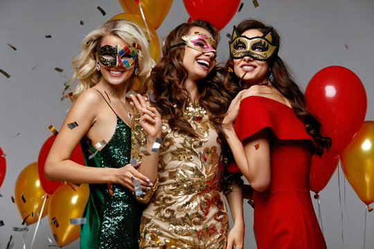 Party. Beautiful Women In Masks Celebrating New Year