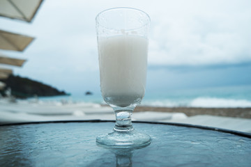 milkshake on the background of the sea