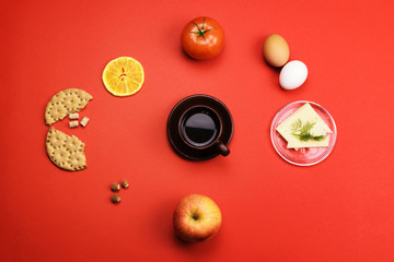 Assorted healthy food on a colored background